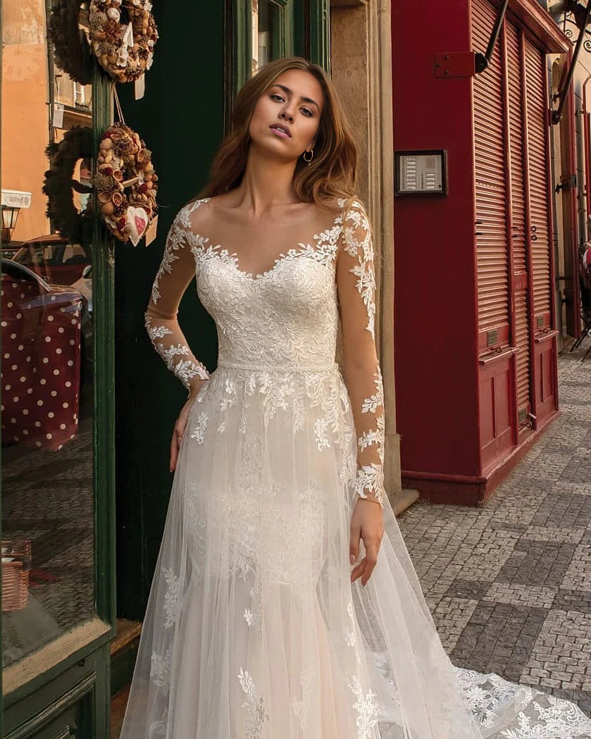 Vestidos de novia de encaje con mangas largas y corte sirena